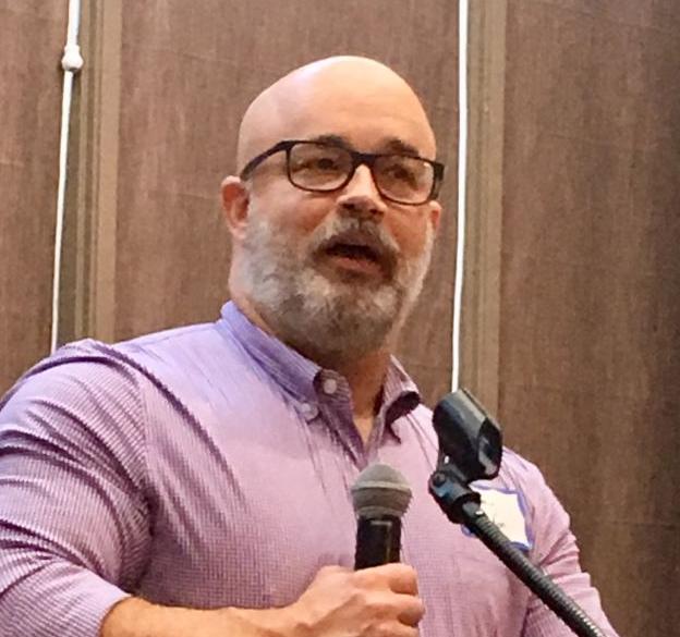 Herndon at podium.jpg